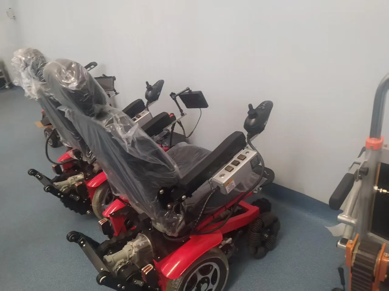 Finished red Movo X units in the QC bay
